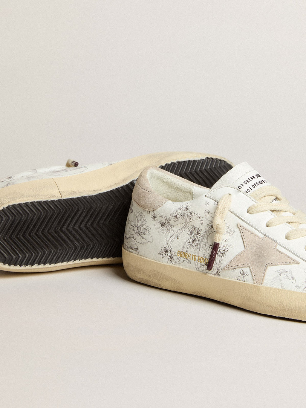 Men’s Super-Star LTD CNY in white leather with lettering on the upper