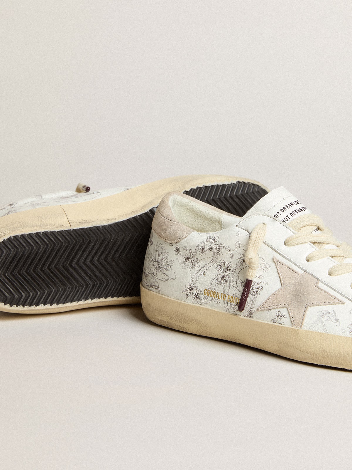 Men’s Super-Star LTD CNY in white leather with lettering on the upper
