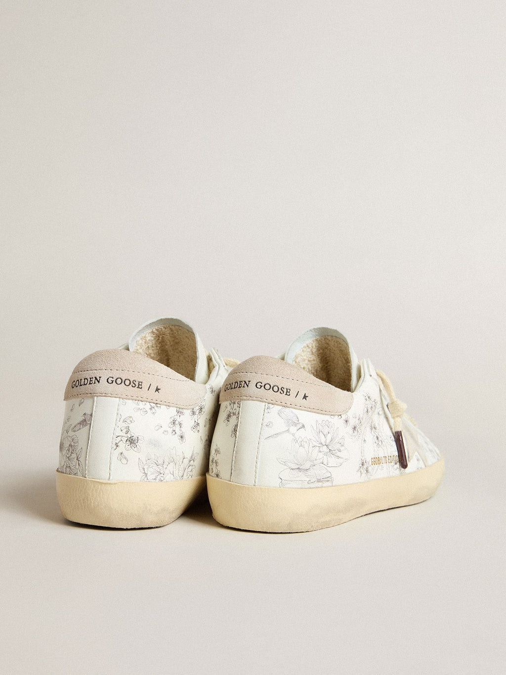 Men’s Super-Star LTD CNY in white leather with lettering on the upper