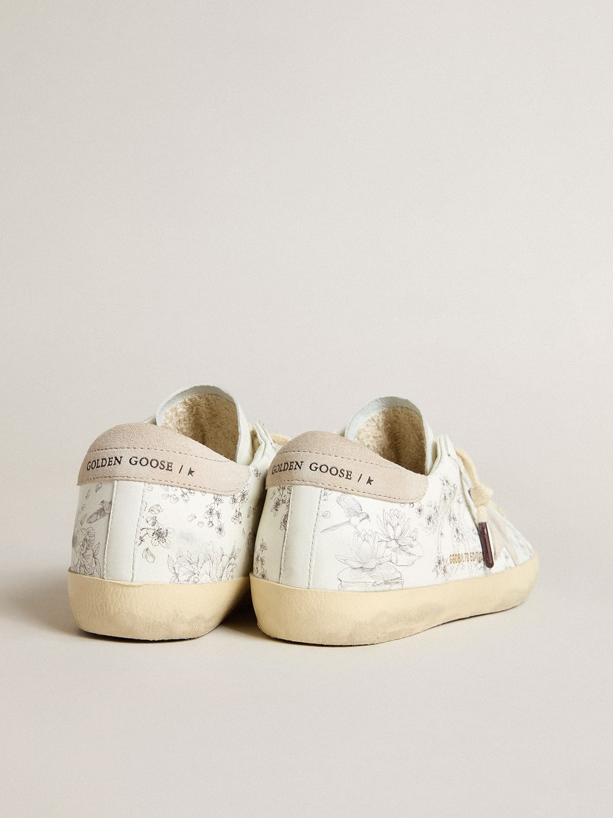 Men’s Super-Star LTD CNY in white leather with lettering on the upper