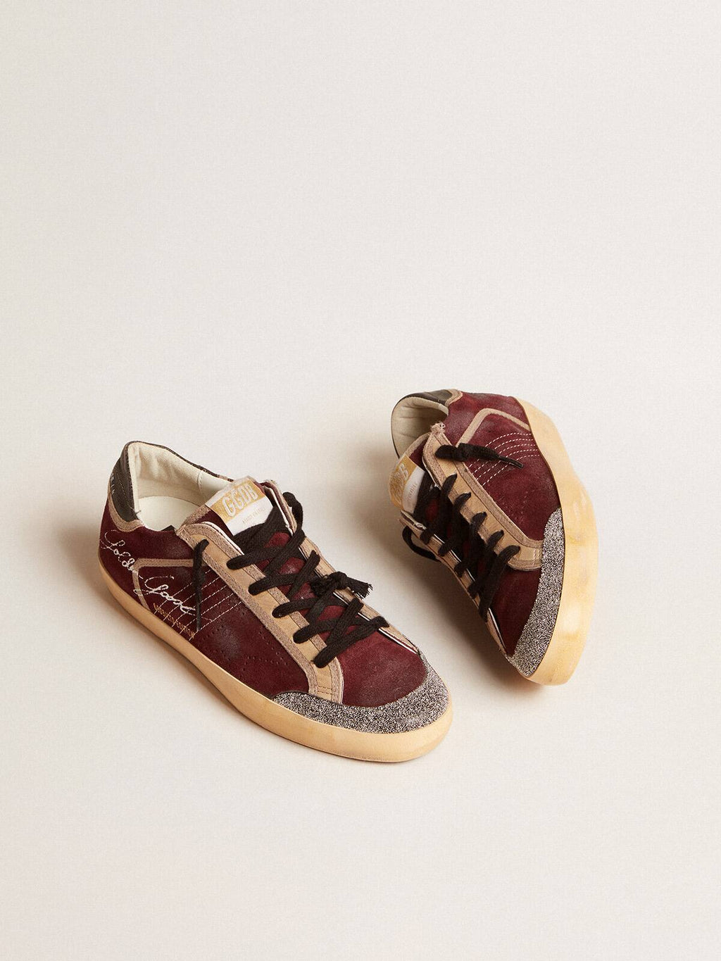 Men’s Super-Star Penstar LAB in burgundy suede with perforated star