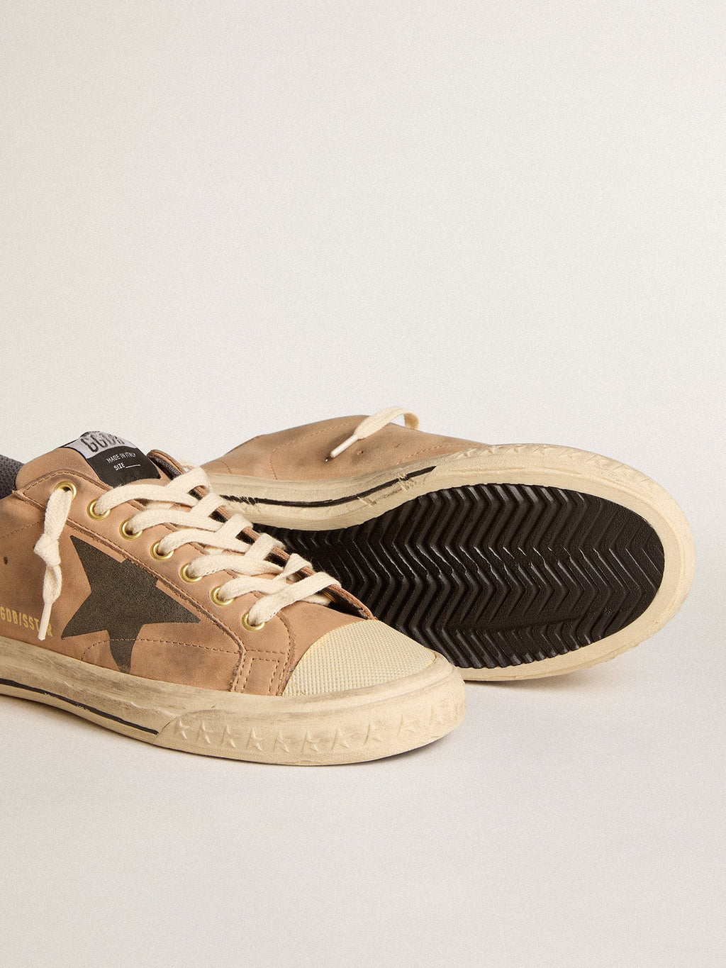 Super-Star in beige nubuck with black printed star and leather heel tab